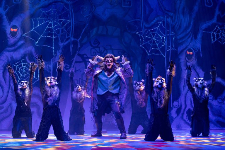 Aidan Banyard (Beast, Prince Henri) and the ensemble in Beauty and the Beast. Photo by Sam Taylor.